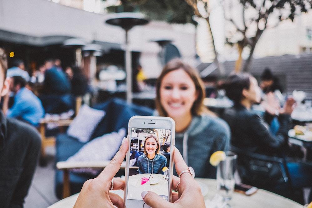 how to get brand deals- woman phone